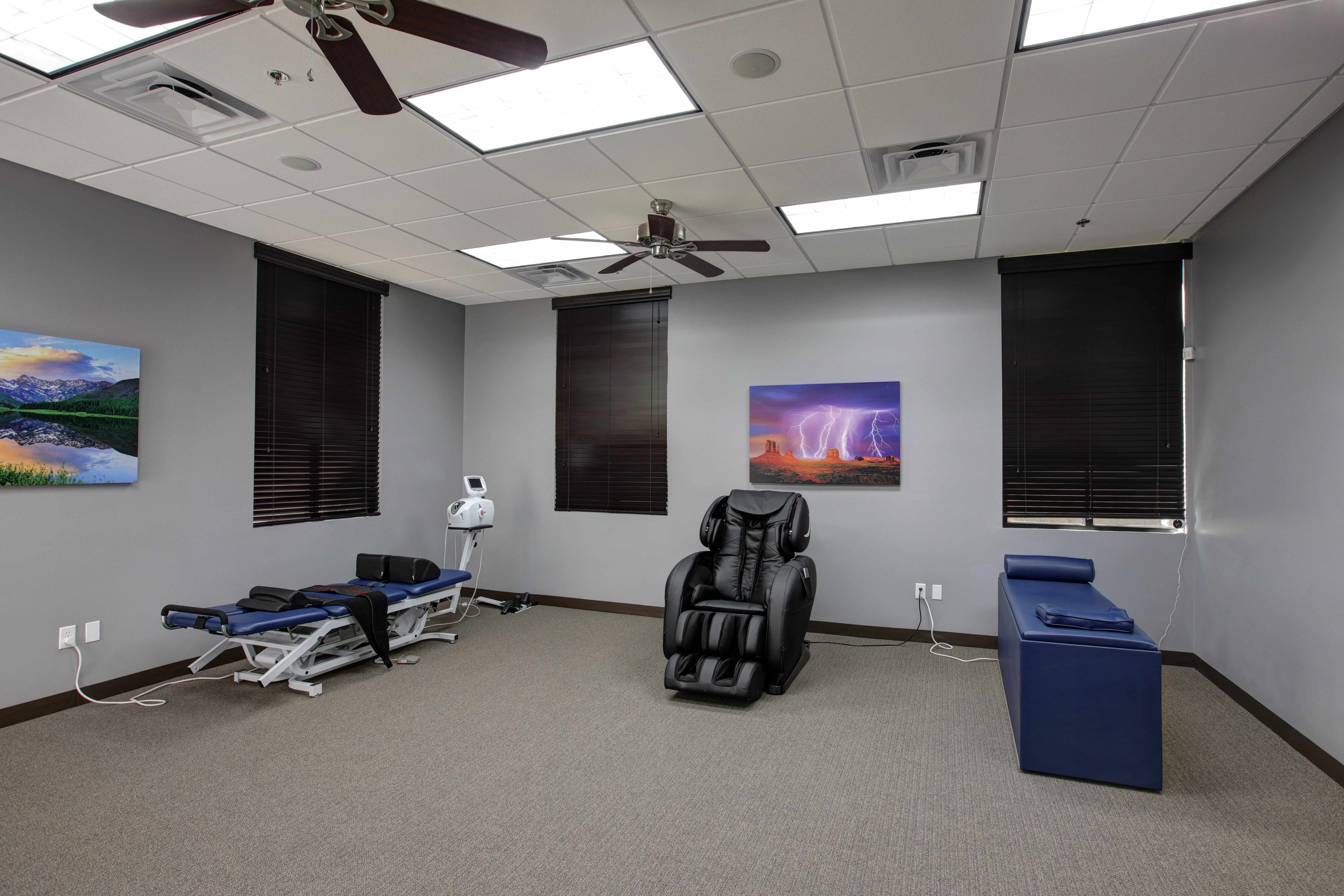 Therapy room with decompression table and chair